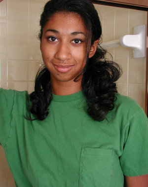 18 year old black girl Nia Nacci doffs school clothes to poses naked